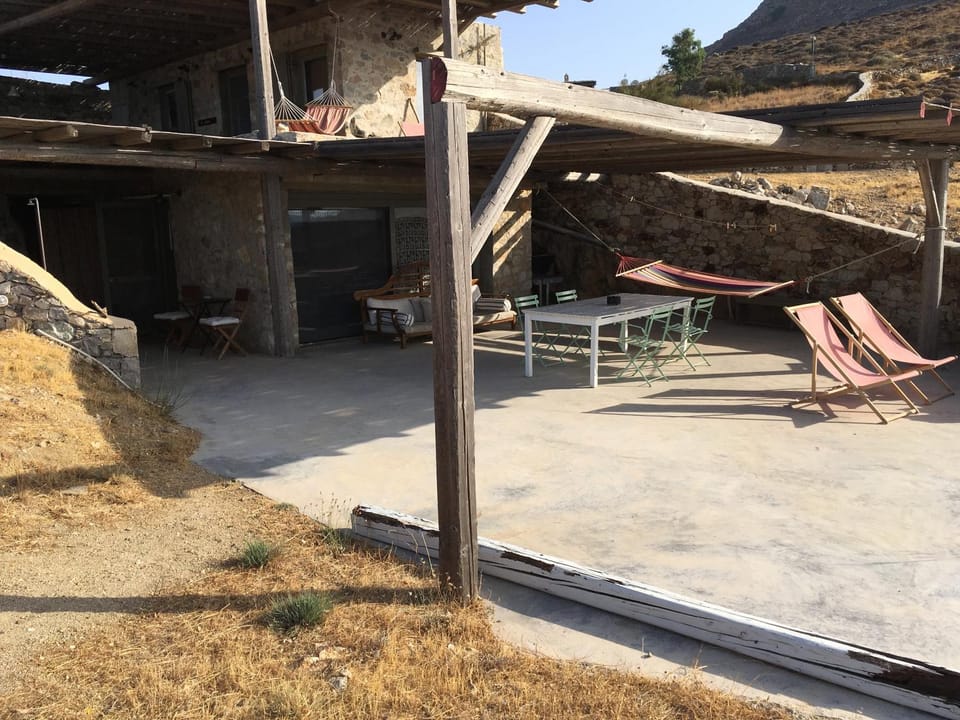 Property building, Patio, Natural landscape, sunbed