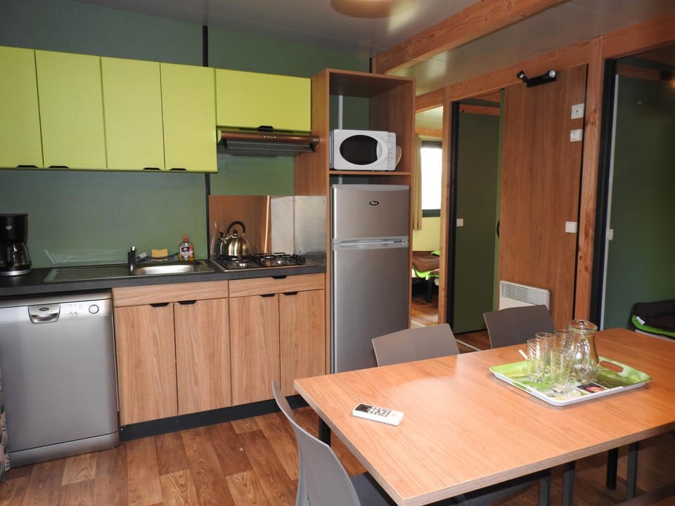 Dining area, dishwasher, stove, toaster