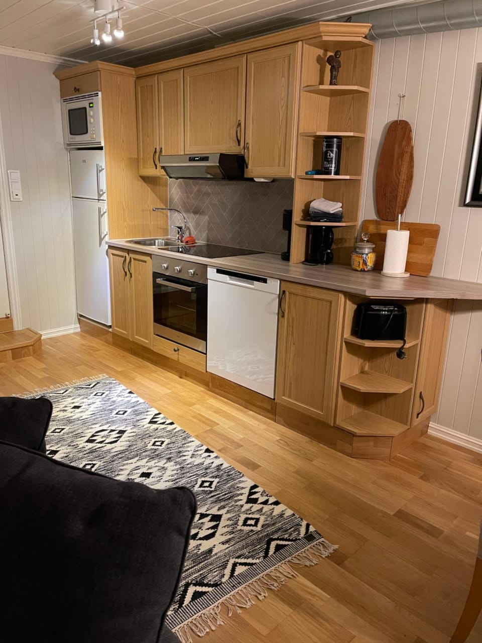 Kitchen or kitchenette, dishwasher, stove, toaster