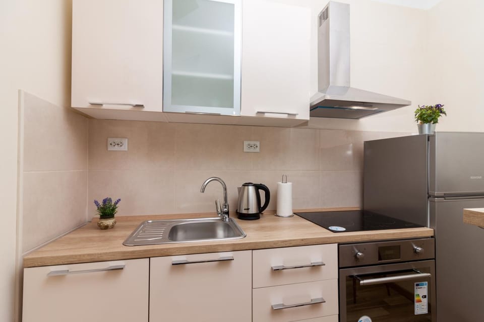 Kitchen or kitchenette, oven