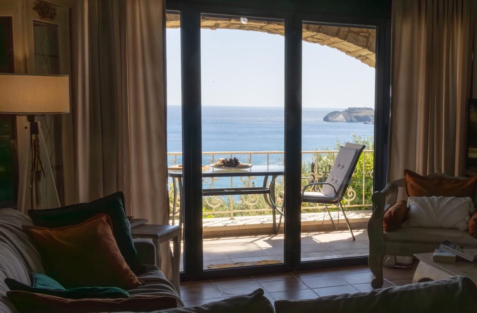 View (from property/room), Balcony/Terrace, Living room, Seating area, Sea view