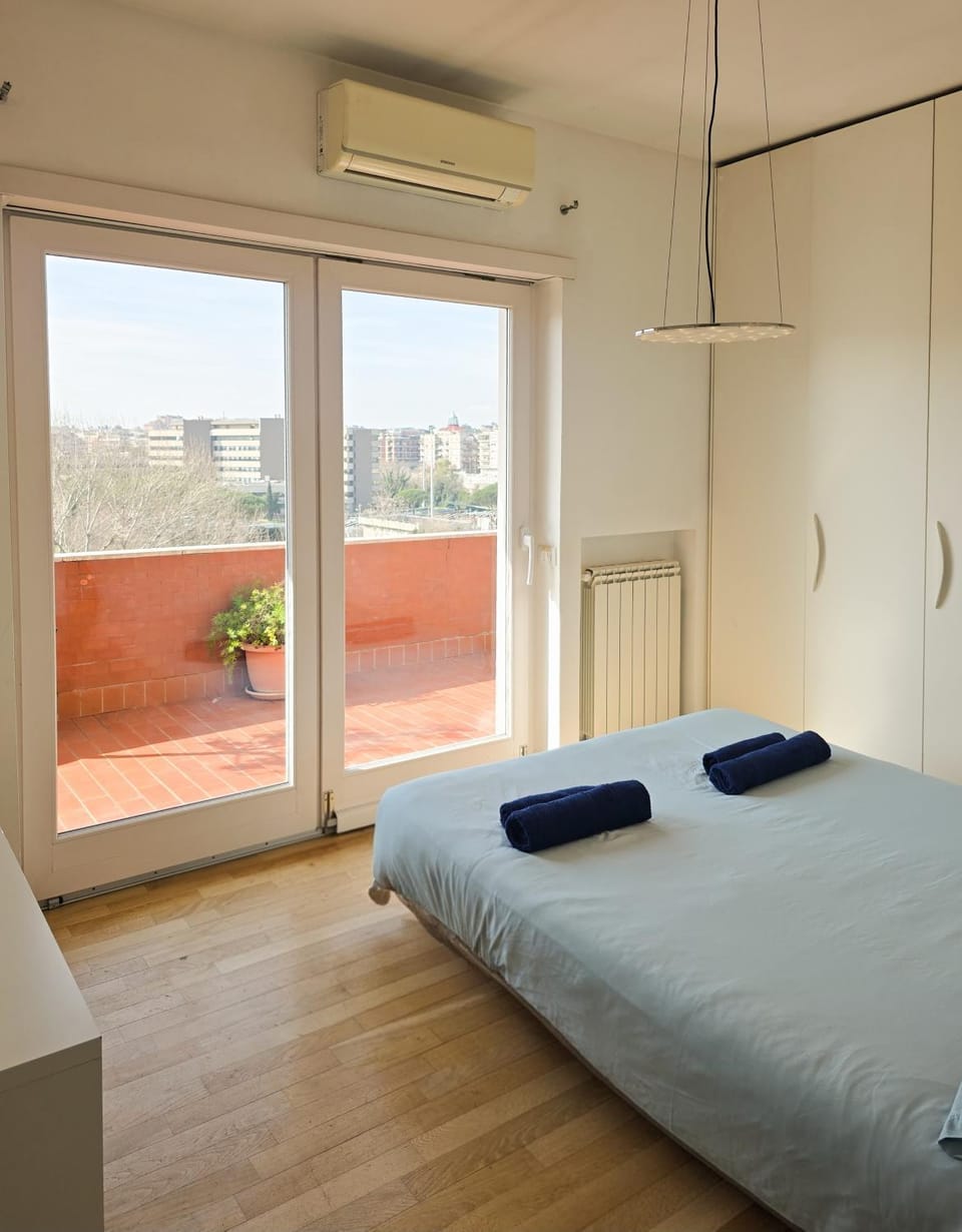Bed, Photo of the whole room, Bedroom, towels, air conditioner