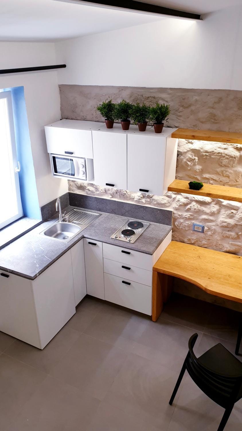 Kitchen or kitchenette, stove