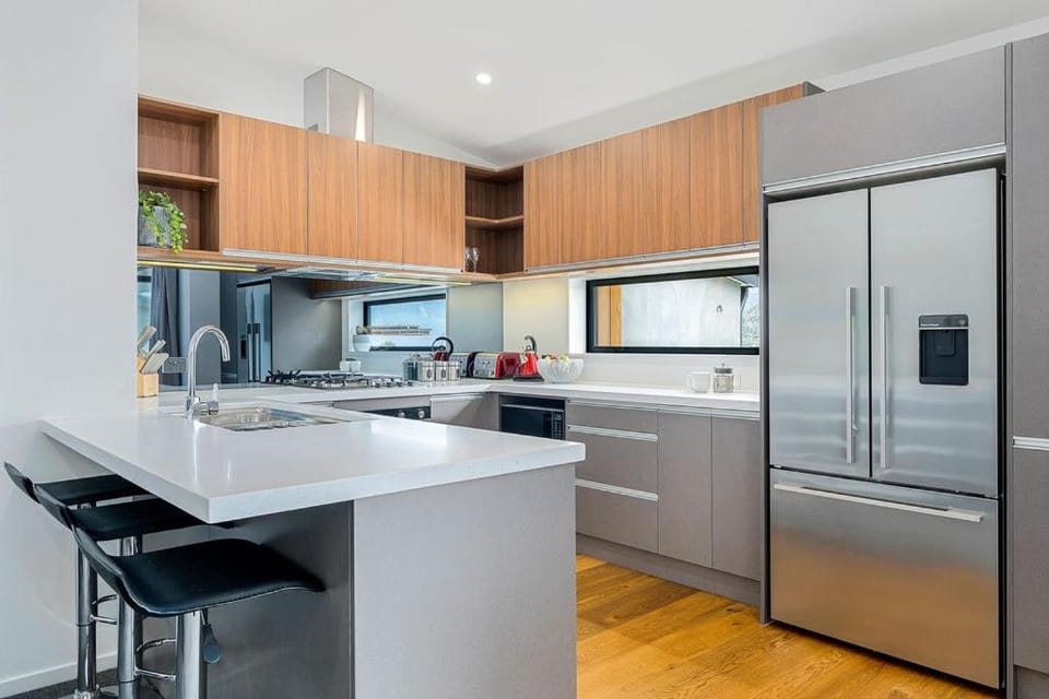 Kitchen or kitchenette, dishwasher, oven, stove, toaster