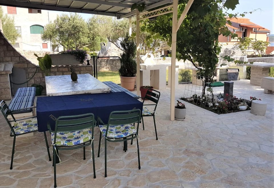 Patio, BBQ facilities, Garden view, Sea view