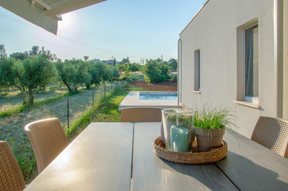 Property building, Patio, Day, Garden, View (from property/room), Balcony/Terrace, Living room, Seating area, Dining area, Garden view, Pool view, Swimming pool