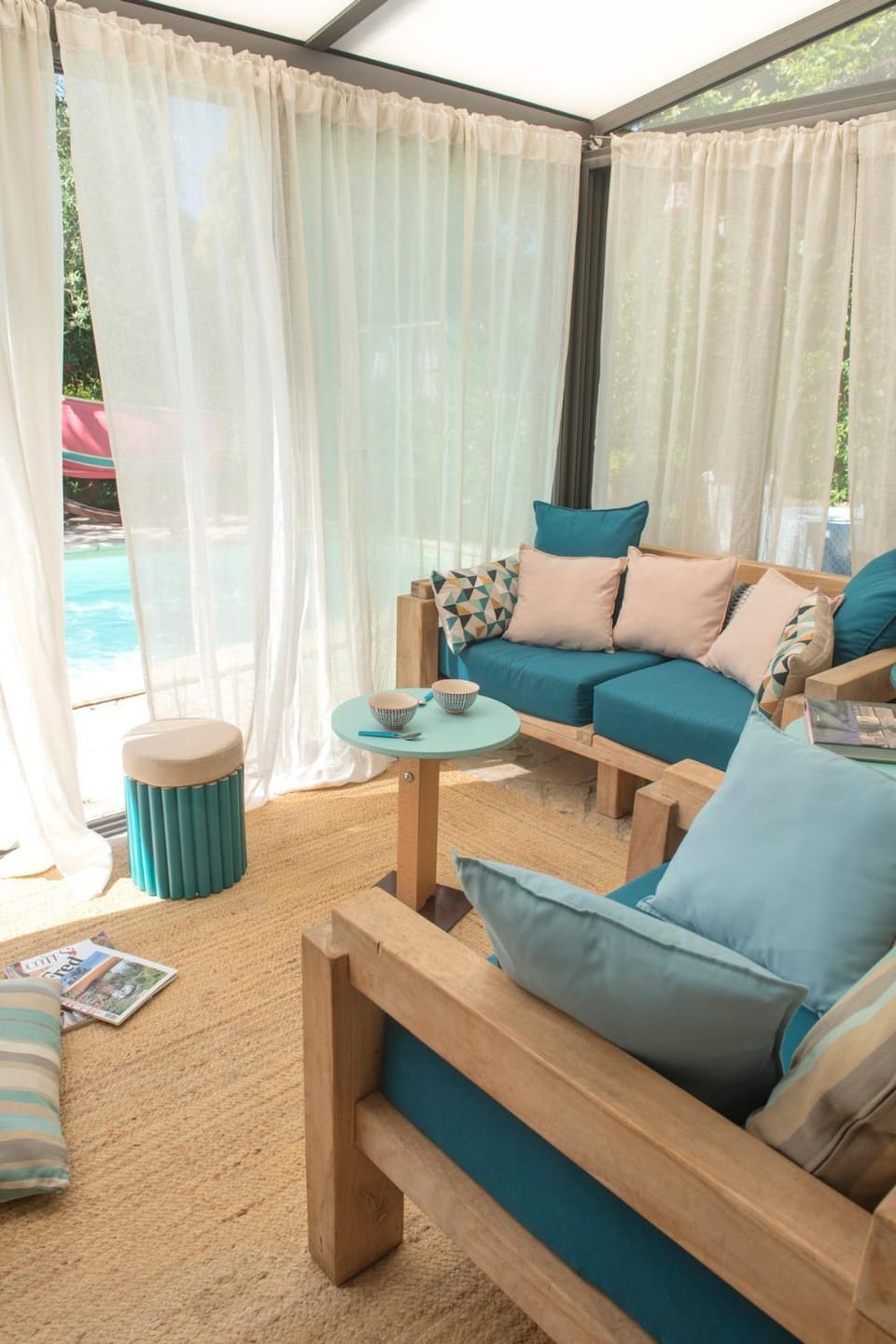 Patio, Living room, Seating area, Pool view, Swimming pool