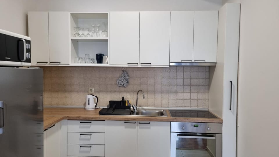 Kitchen or kitchenette, oven, stove