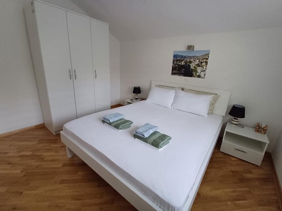 Bed, Bedroom, towels, wardrobe, air conditioner