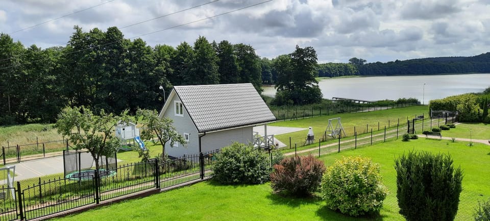 Szary domek nad jeziorem SEA & LAKE House in West Pomeranian Voivodeship, Poland