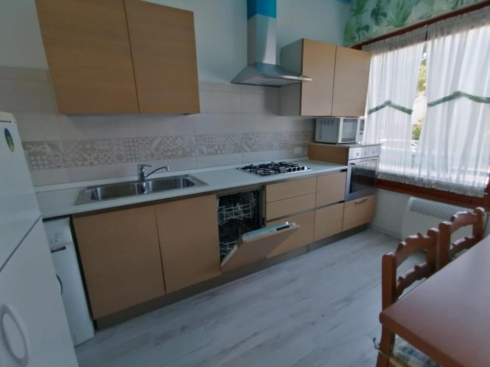Kitchen or kitchenette, stove