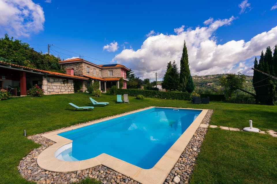 Property building, Spring, Day, Natural landscape, Garden, View (from property/room), Garden view, Pool view, Swimming pool, sunbed
