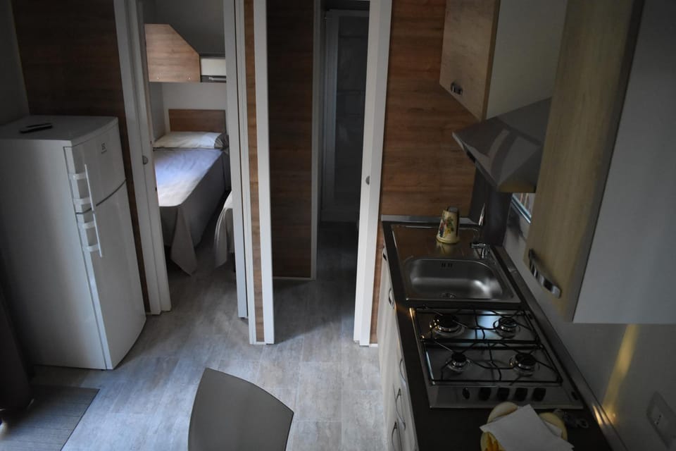 Kitchen or kitchenette, stove