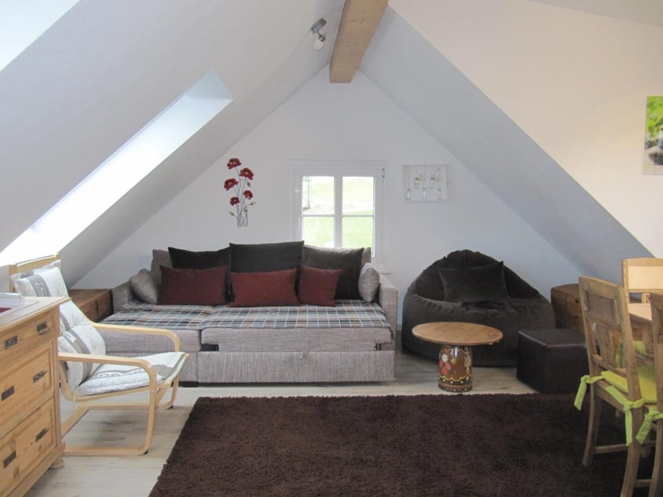 Bed, Living room, Seating area