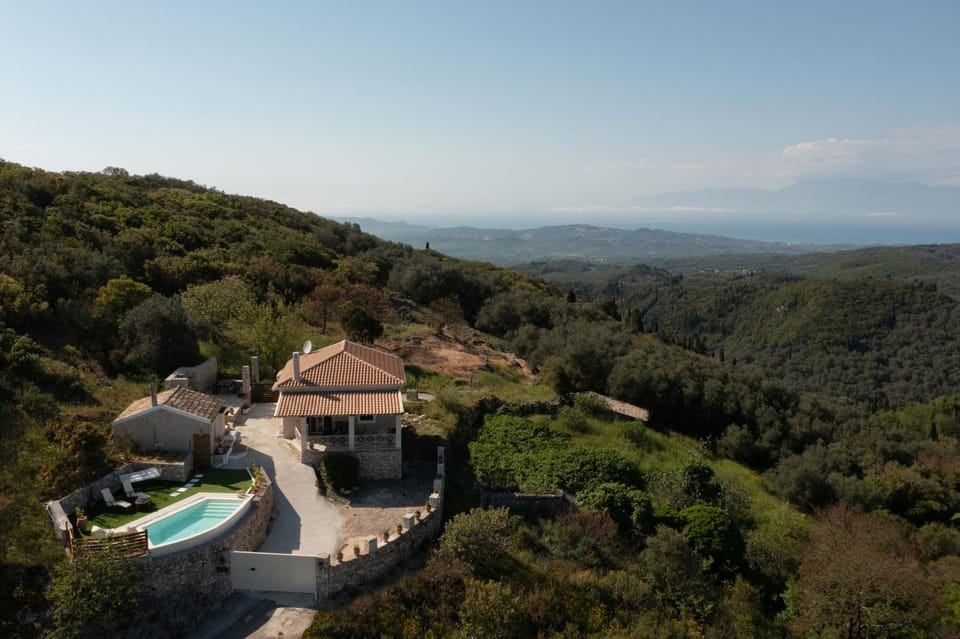 Property building, View (from property/room), Mountain view, Sea view, Swimming pool