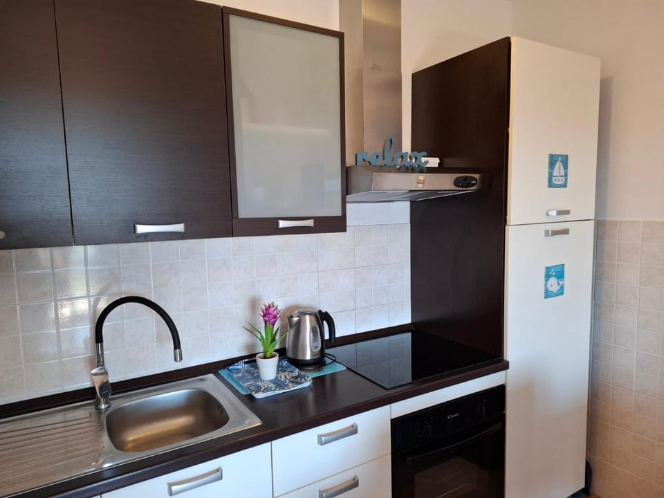 Kitchen or kitchenette, stove