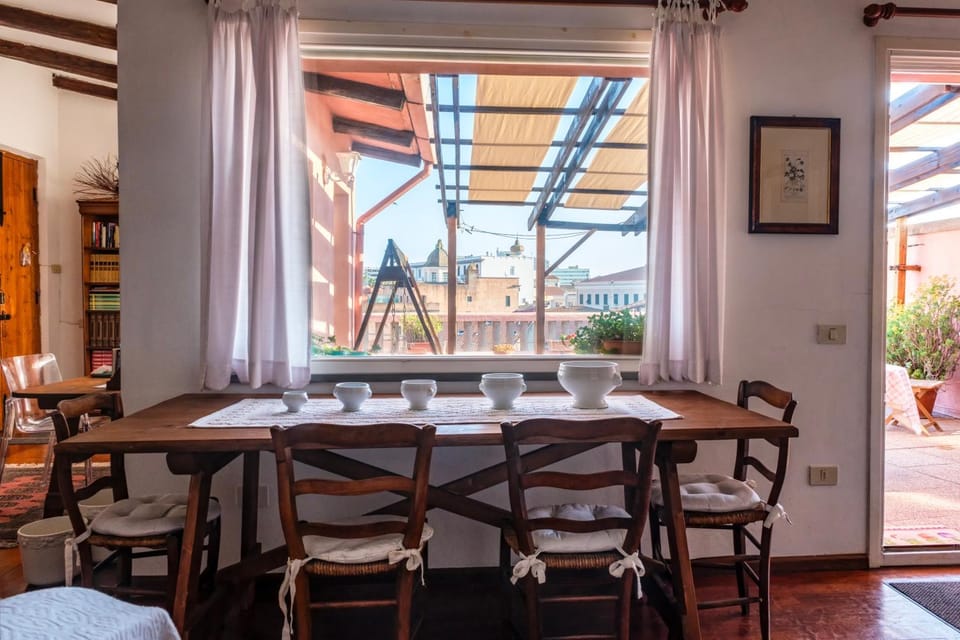 Attico in centro con vista della torre - Cozy penthouse facing to the tower Apartment in Oristano