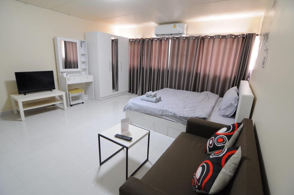 ป๊อปปูล่า คอนโด อาคาร C4 impact เมืองทองธานี Apartment in Bangkok