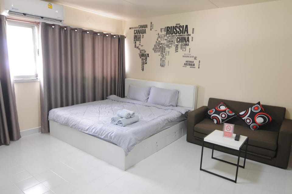 ป๊อปปูล่า คอนโด อาคาร C4 impact เมืองทองธานี Apartment in Bangkok