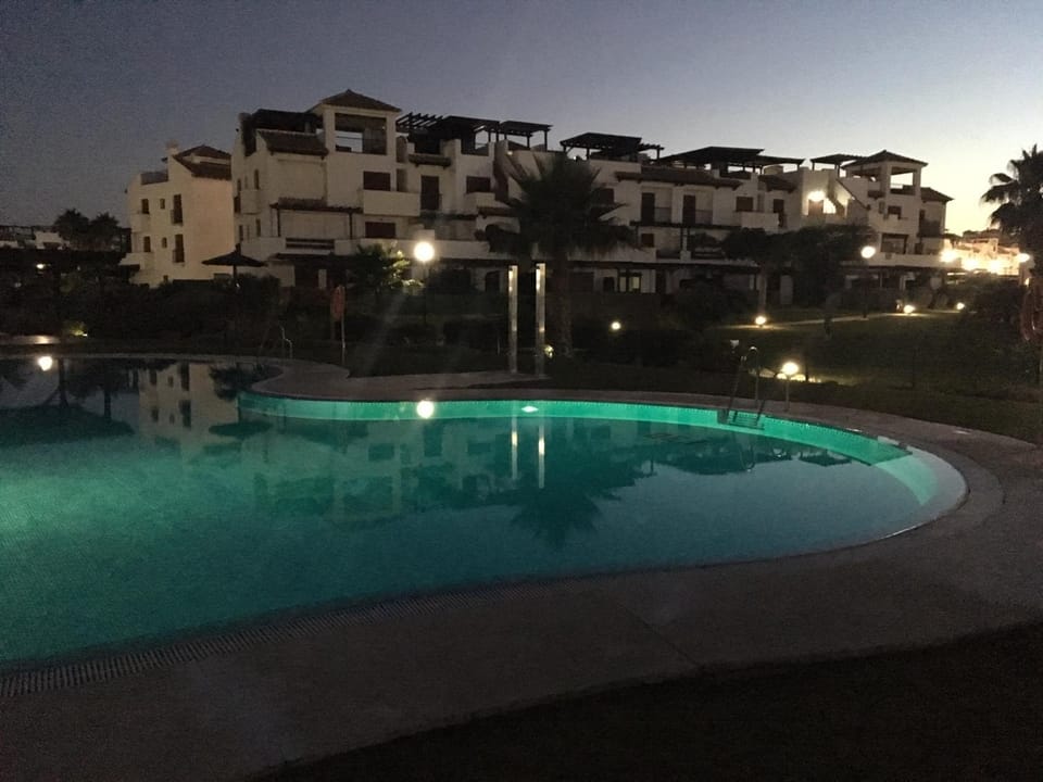 Property building, Swimming pool, Sunset
