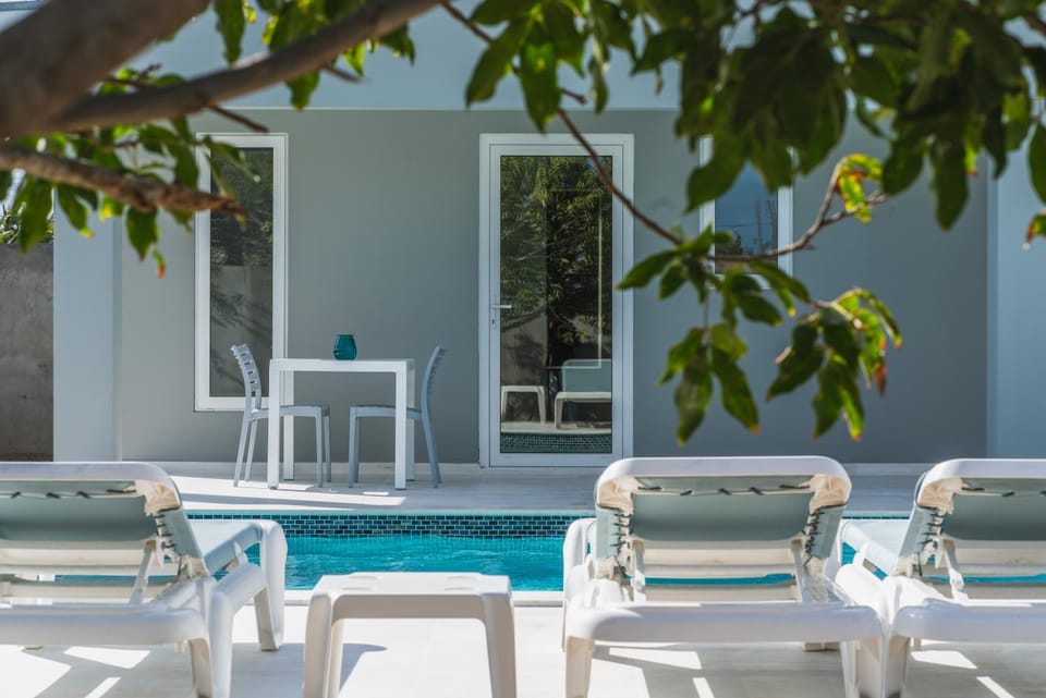 Patio, Seating area, Pool view, Swimming pool