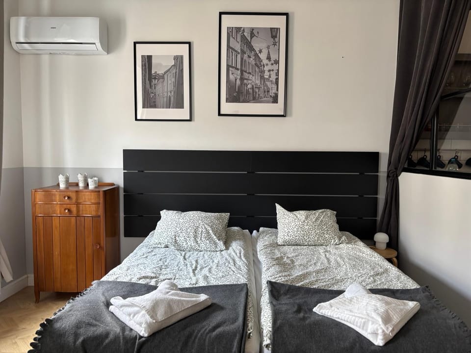 Bed, Photo of the whole room, Bedroom, towels, air conditioner