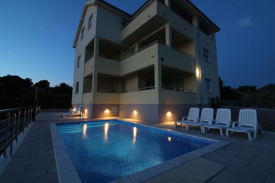 Property building, Swimming pool, Swimming pool, Sunset