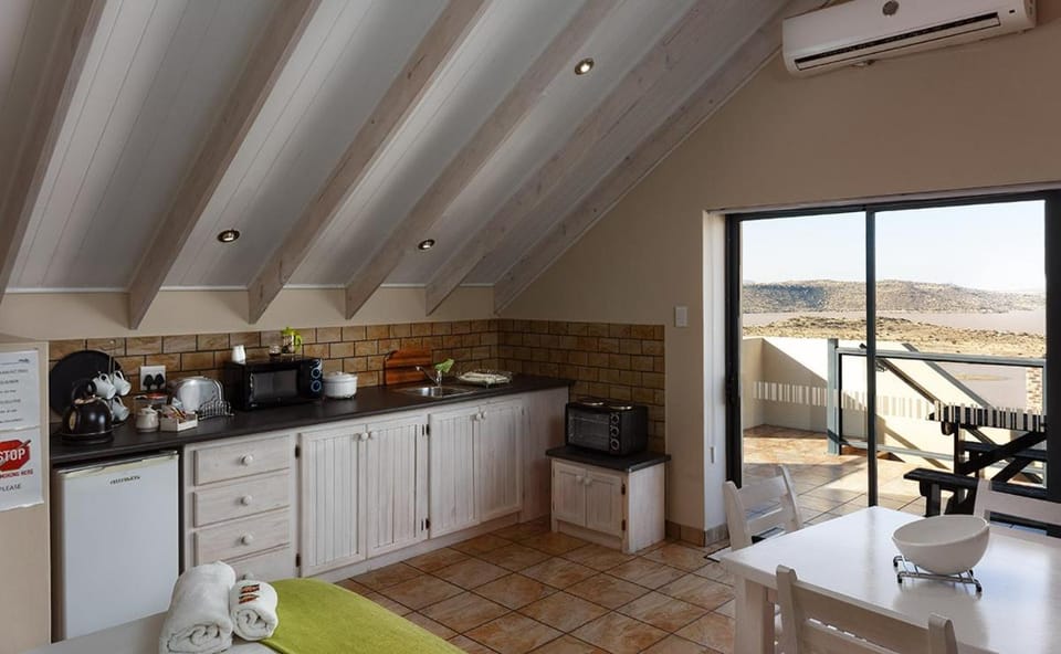 BBQ facilities, Balcony/Terrace, Kitchen or kitchenette, Living room, Dining area, Bedroom