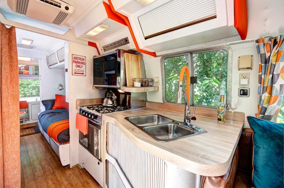 Kitchen or kitchenette, oven, stove, air conditioner