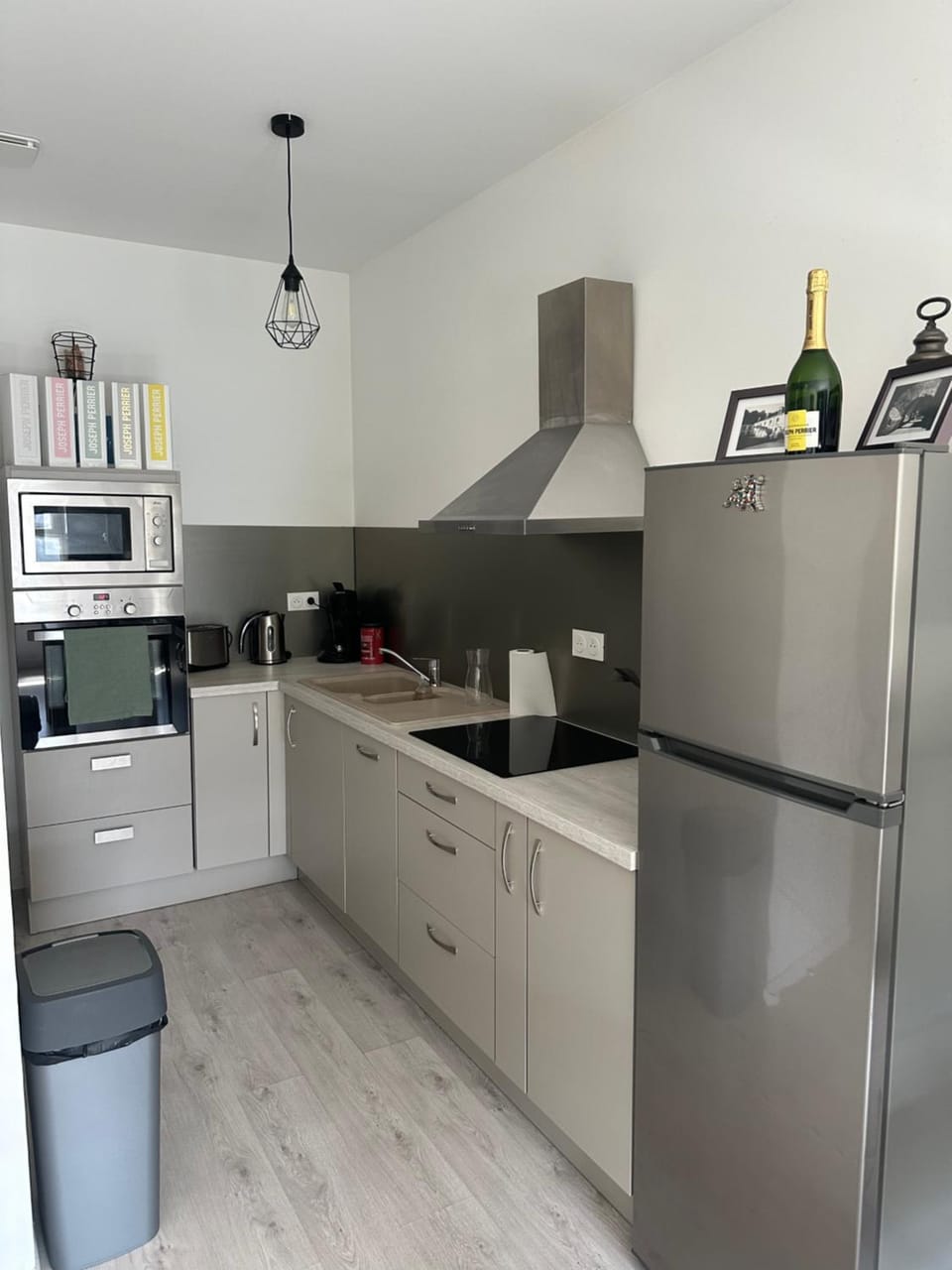 Kitchen or kitchenette, dishwasher, oven, stove