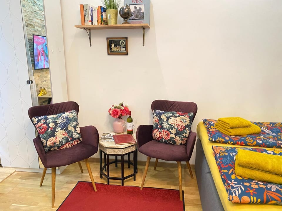 Bed, Living room, Seating area, Bedroom