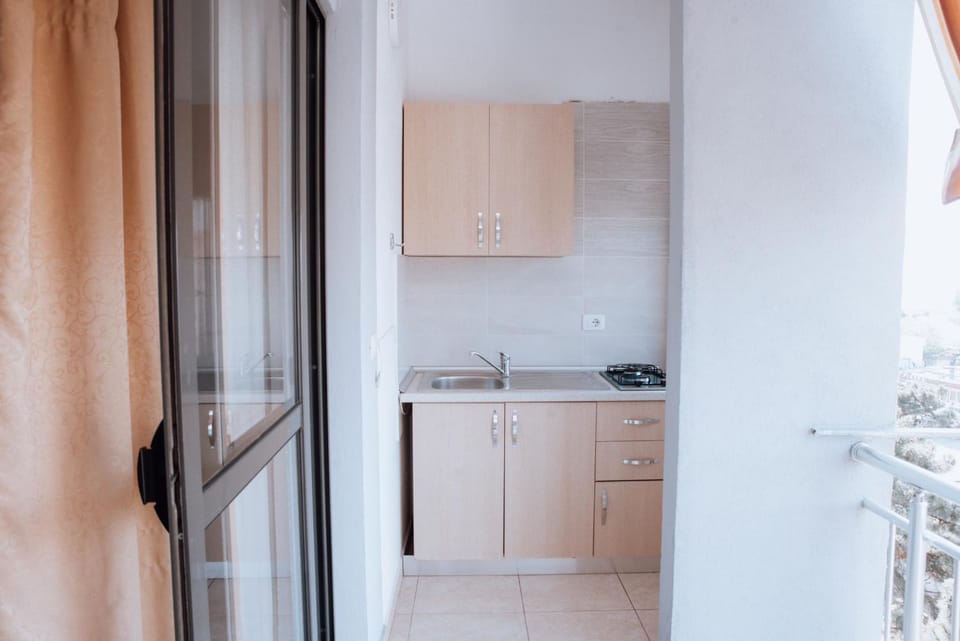 Kitchen or kitchenette, stove