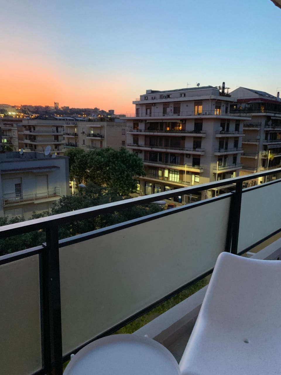 Property building, View (from property/room), Balcony/Terrace, Balcony/Terrace, City view, Sunset