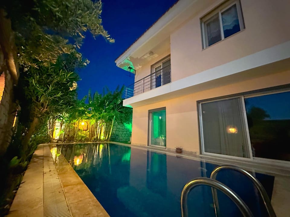 Property building, Night, Pool view, Swimming pool