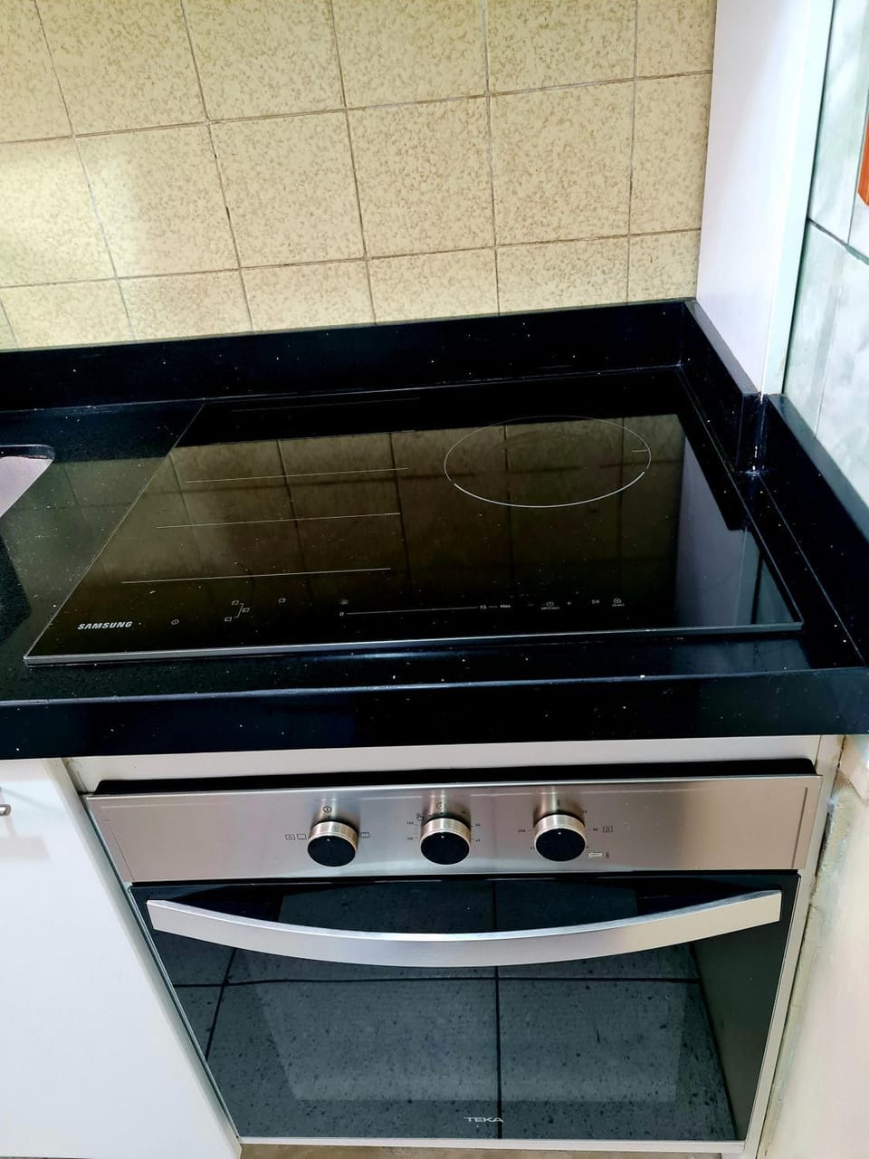 Kitchen or kitchenette, oven