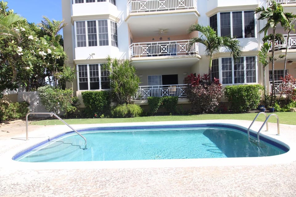 Beachfront Apartment in St. Lawrence Gap - Close To Your Every Need Apartment in Oistins