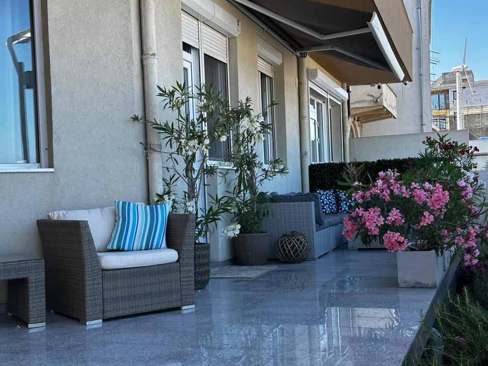 Property building, Day, Garden, View (from property/room), Balcony/Terrace, Living room, Seating area, Garden view