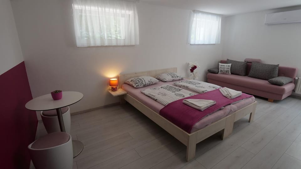 Bed, Living room, Seating area, Bedroom