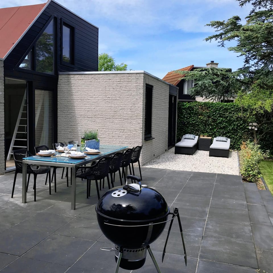 Property building, Patio, Living room, Dining area