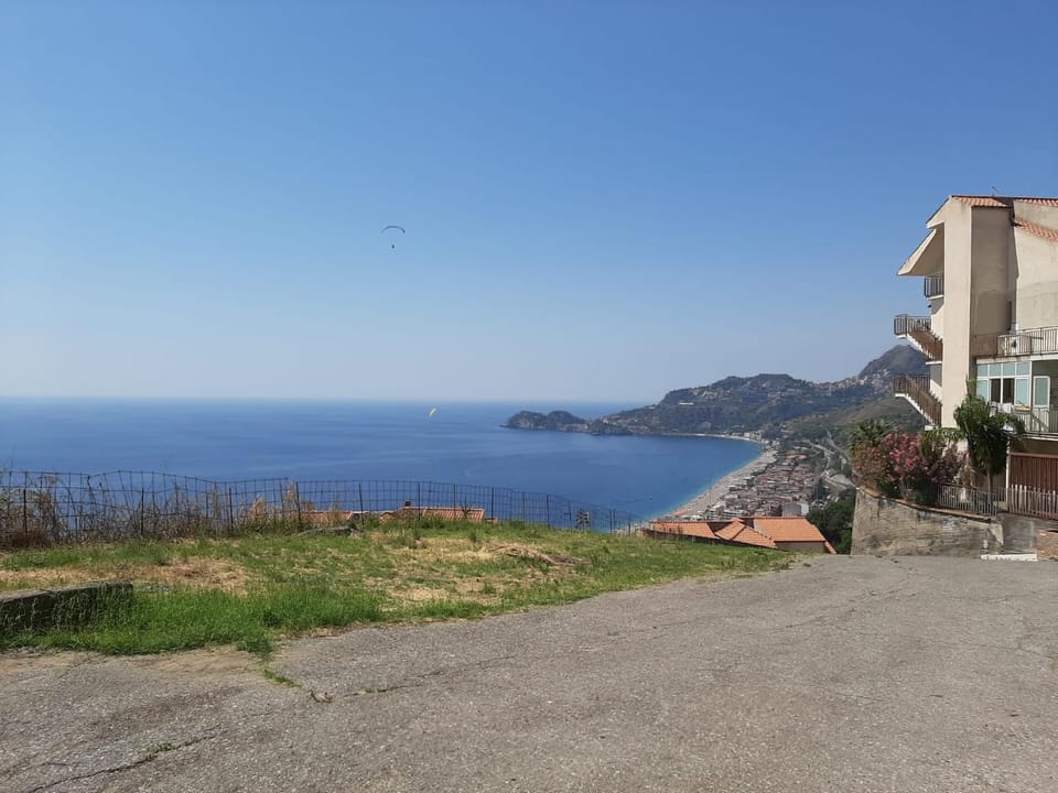Property building, Nearby landmark, Day, Natural landscape, Lake view, Mountain view, Sea view
