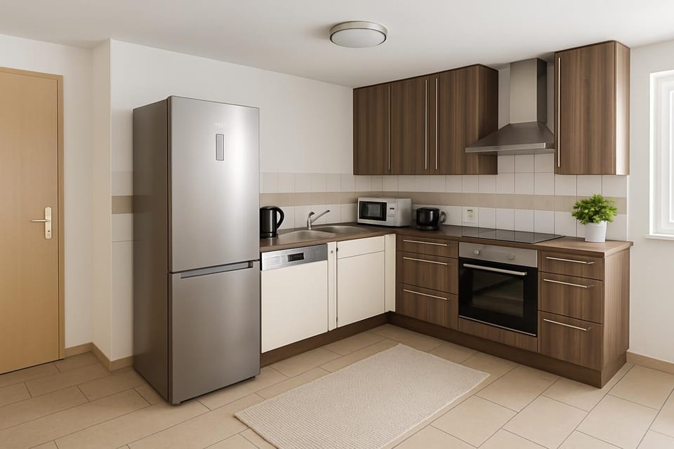 Kitchen or kitchenette, dishwasher, oven, stove