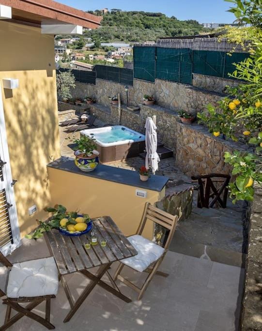 Property building, Patio, Natural landscape, Hot Tub, View (from property/room), Balcony/Terrace