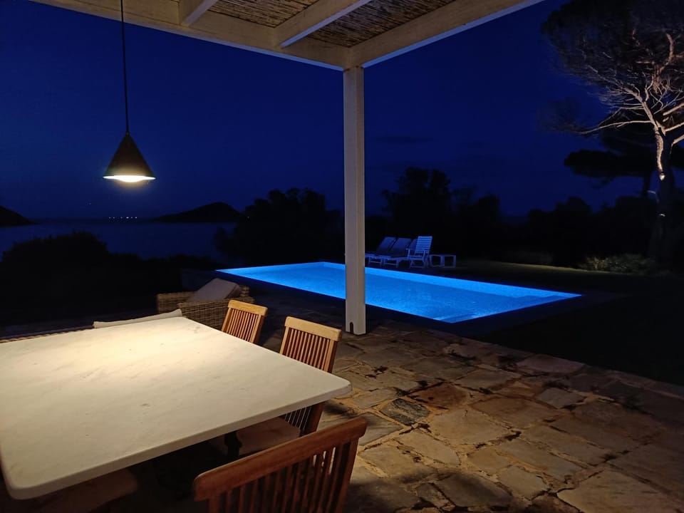 Night, Dining area, Pool view, Swimming pool