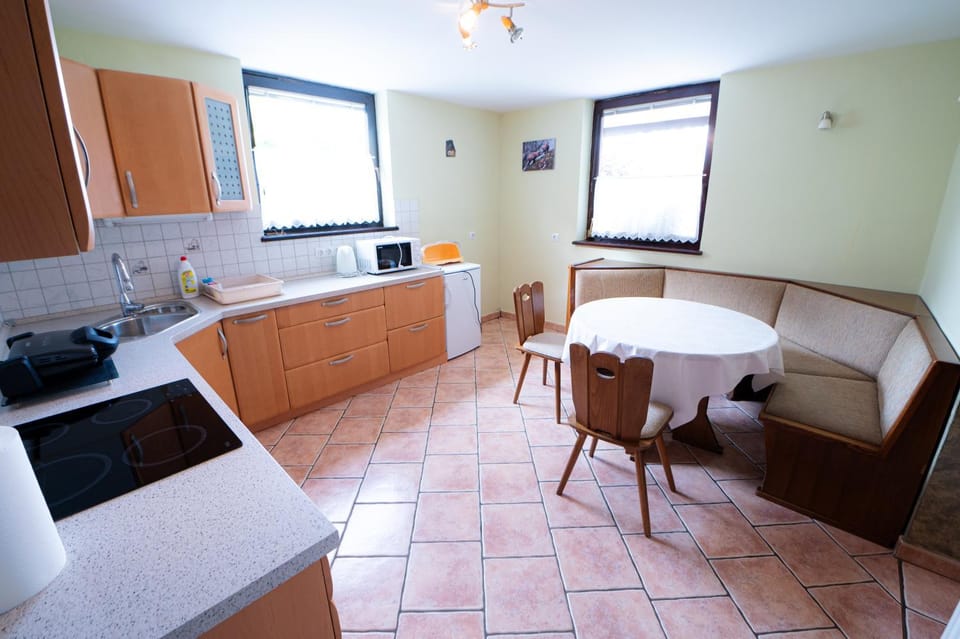 Kitchen or kitchenette, Seating area, Dining area, stove