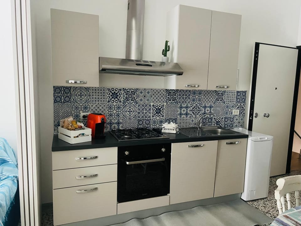 Kitchen or kitchenette, stove