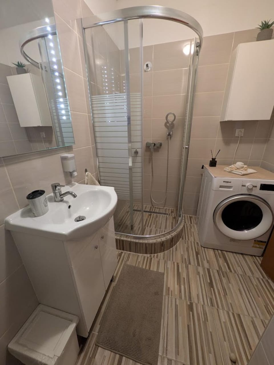 Shower, Toilet, Bathroom, towels, washing machine, dryer