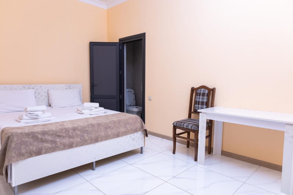 Bed, Photo of the whole room, Bedroom, towels, wardrobe