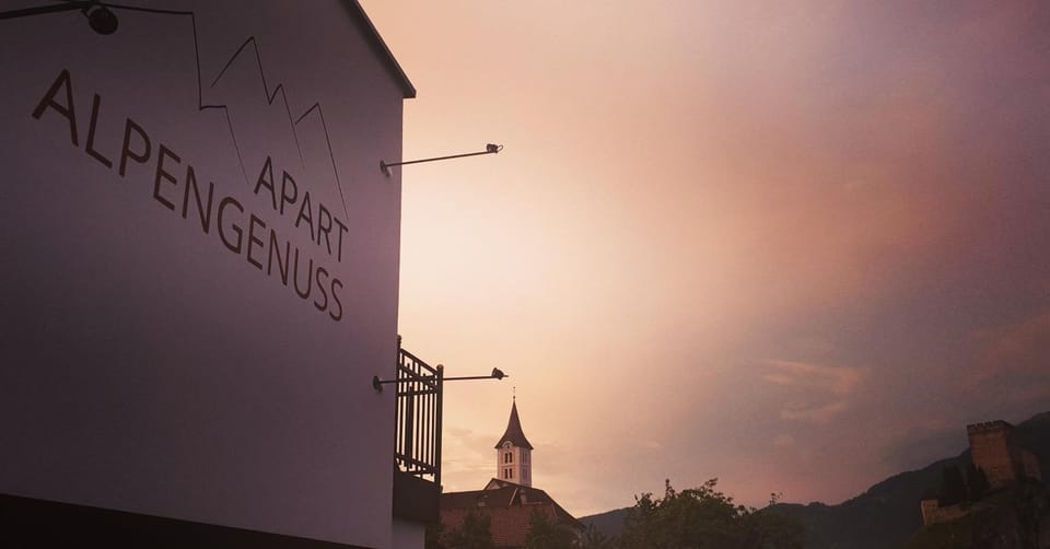 Property building, Nearby landmark, Property logo or sign, Sunset