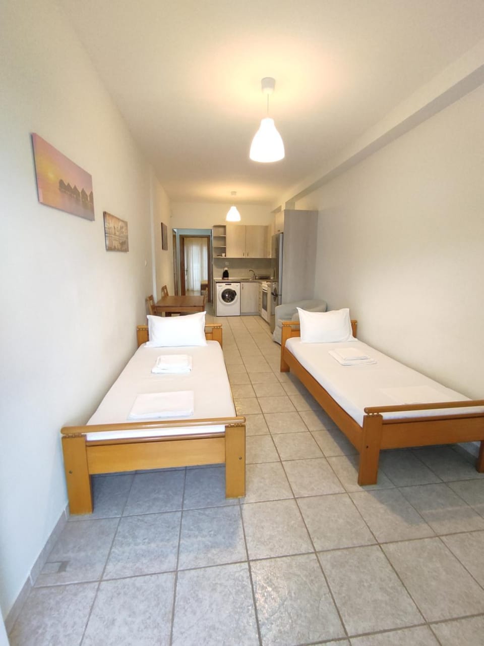 Bed, Dining area, washing machine, kitchen