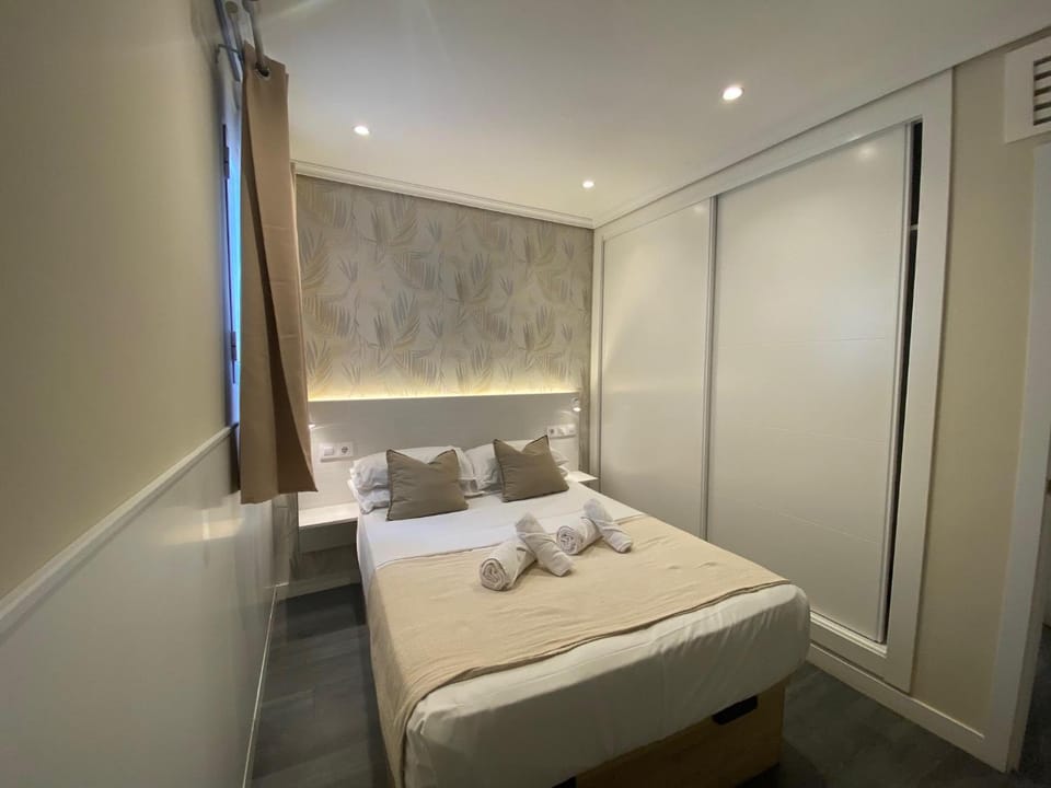 Bed, wardrobe
